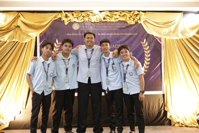BSIT students on stage at a program event
