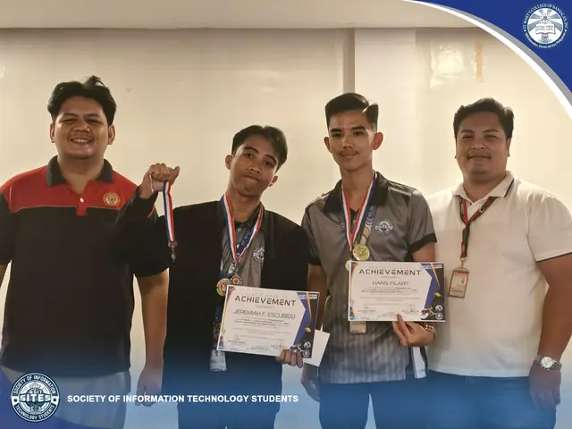 Receiving an achievement certificate and medal with faculty